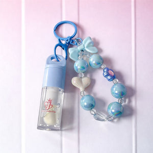 LIP OIL  KEYCHAIN / BIRD OF PARADISE